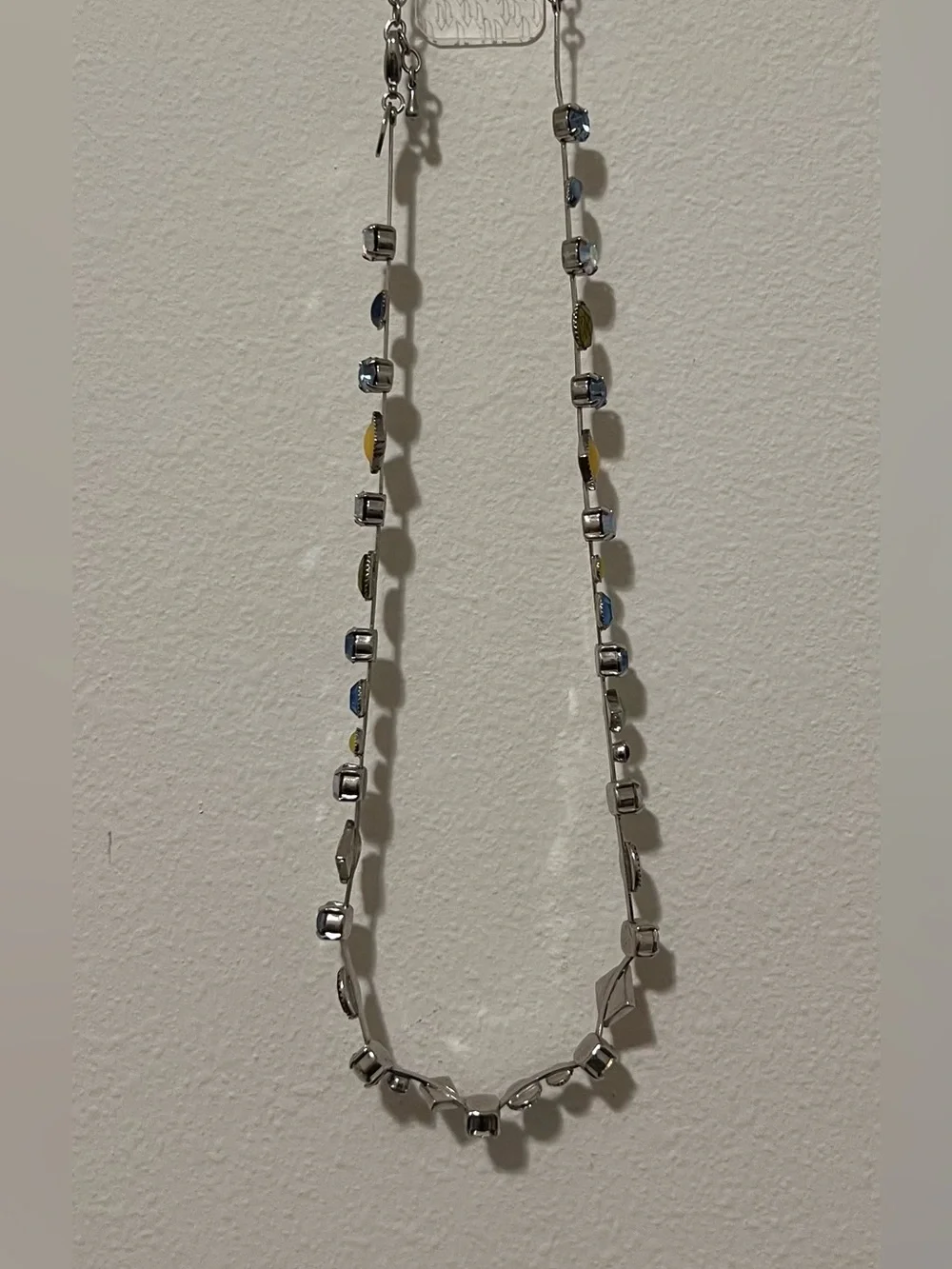Lia Sophia Cache Silver Necklace and matching brac with Blue and Yellow Accents